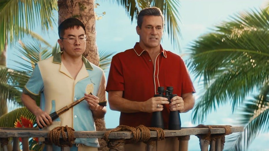 Scarlett Johansson, Jon Hamm and Bowen Yang appear in a Ritz commercial ahead of Super Bowl LX.
