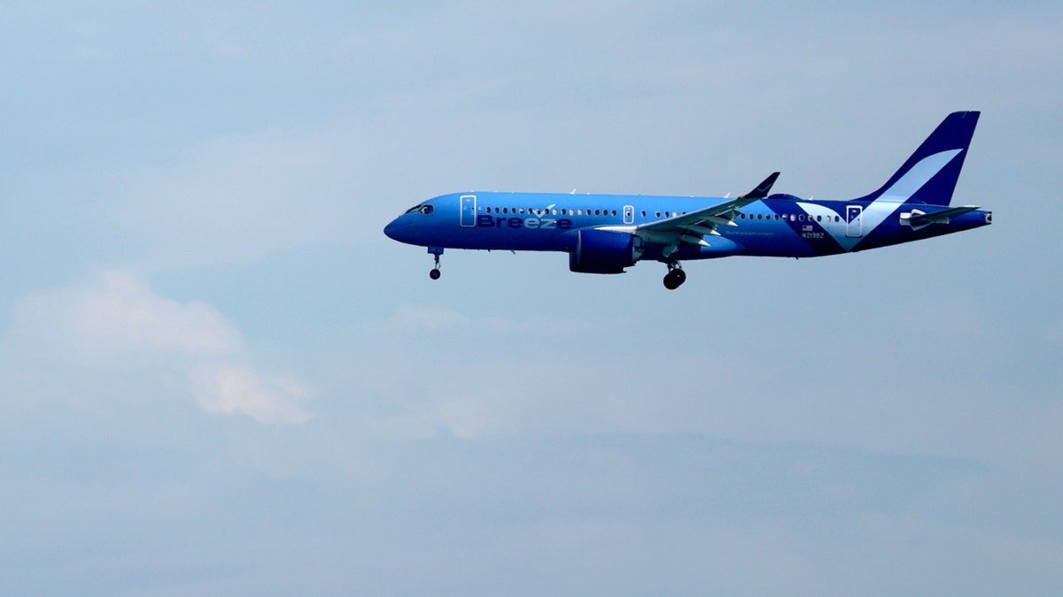 breeze airline flight in sky
