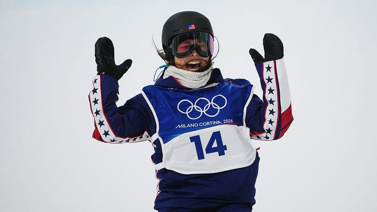 Chloe Kim reacts after snowboard run