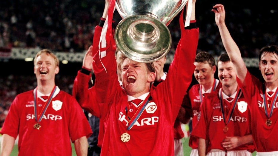 David Beckham lifts trophy