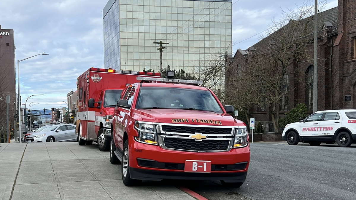 Everett Fire command vehicle and medic unit outside Snohomish County Courthouse following courtroom evacuation over fentanyl residue