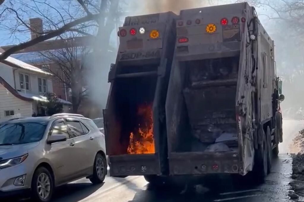 Exclusive | Wild video shows NYC garbage truck literally on fire in middle of snow-packed Queens street