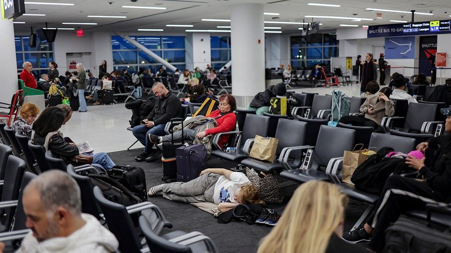 Travelers waiting at airport