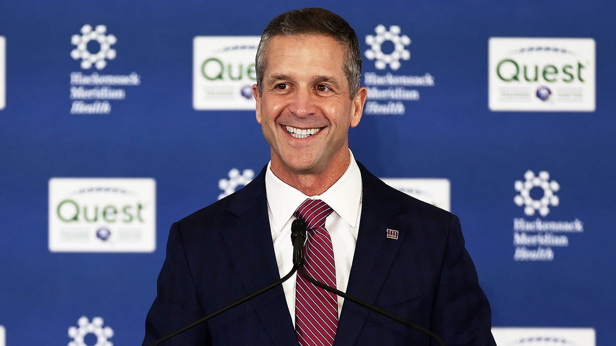 John Harbaugh smiles