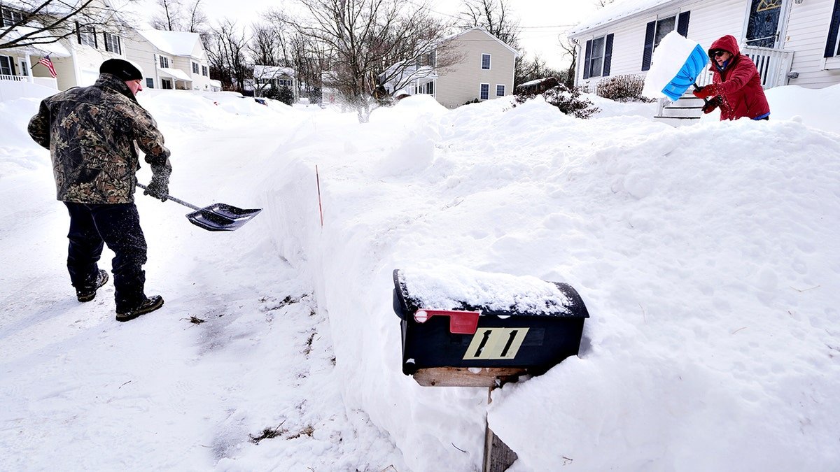 residents dig out driveway in Haverhill