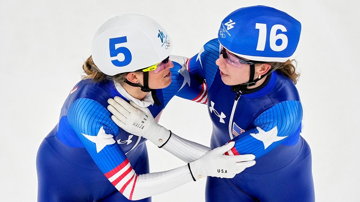 Mia Manganello congratulated by Greta Myers