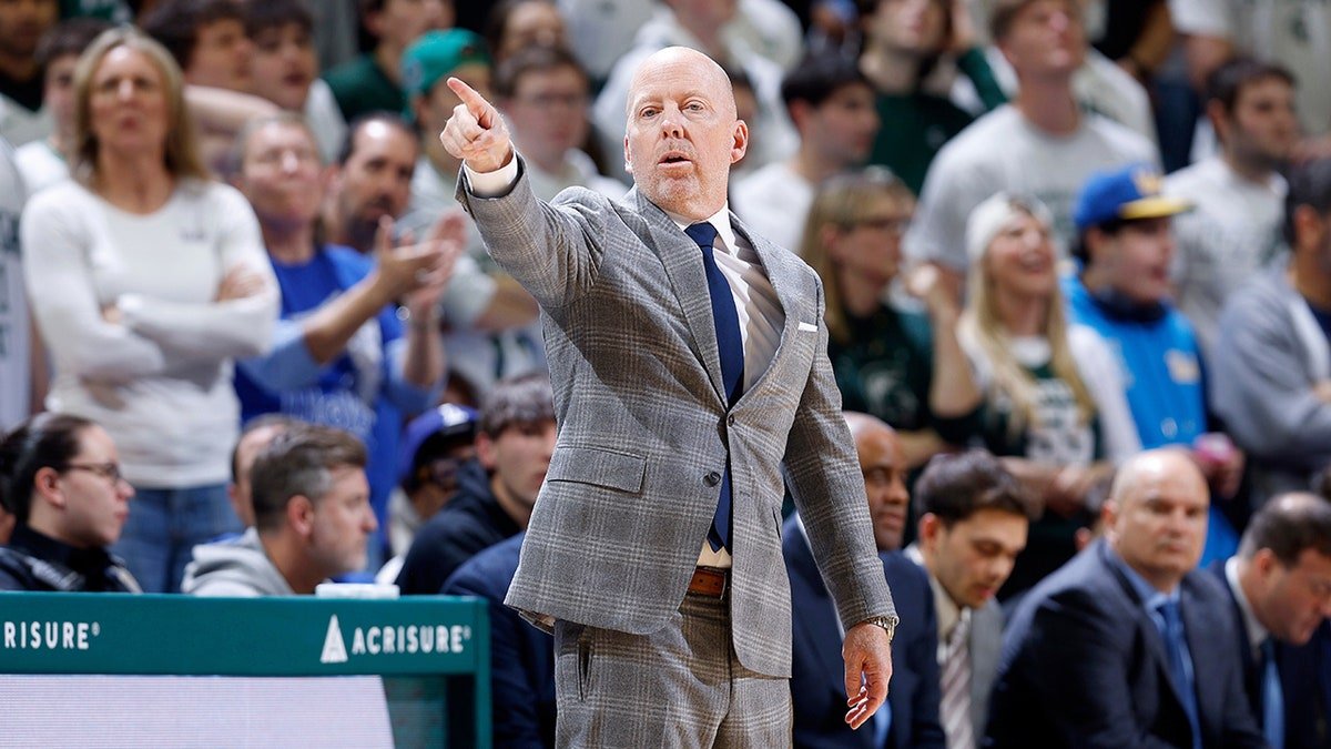 Mick Cronin directs team