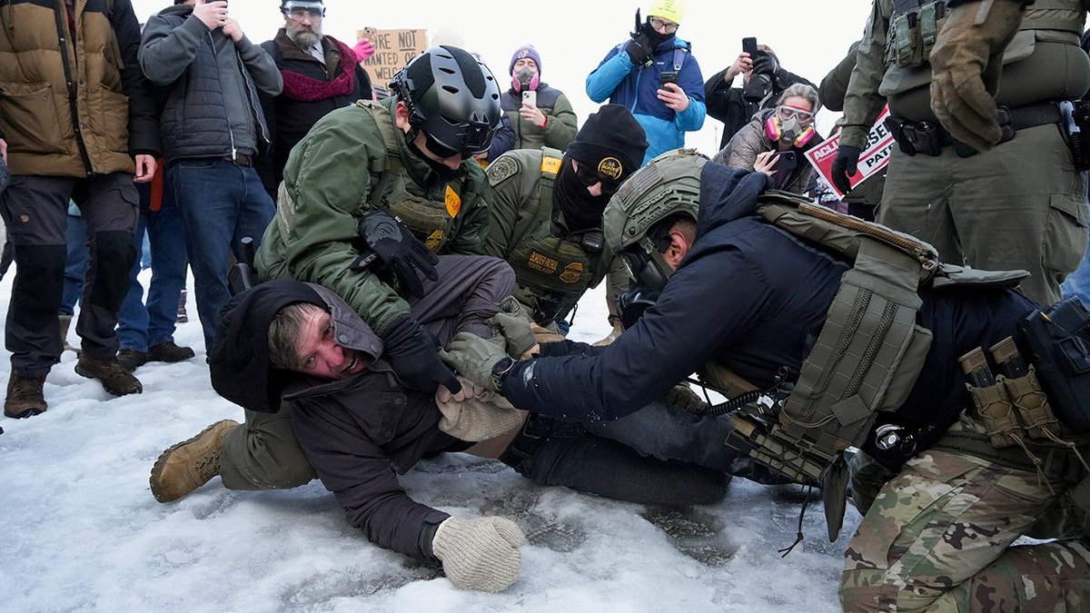Minneapolis ICE protestor is taken down by border patrol