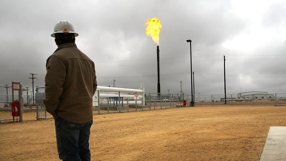 Natural gas burns at a plant on the Permian Basin in Garden City, Texas