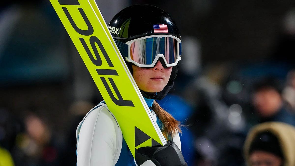 Annika Belshaw looks on