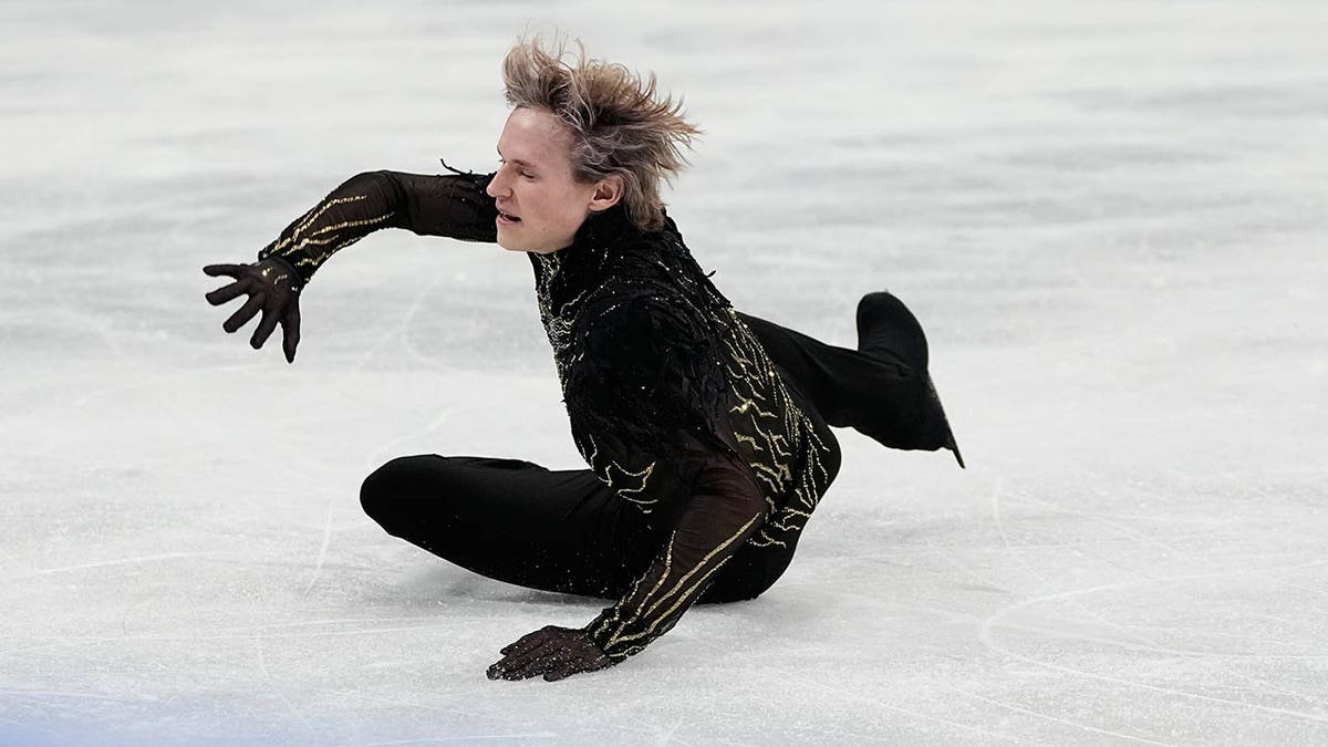 Ilia Malinin falls to the ice