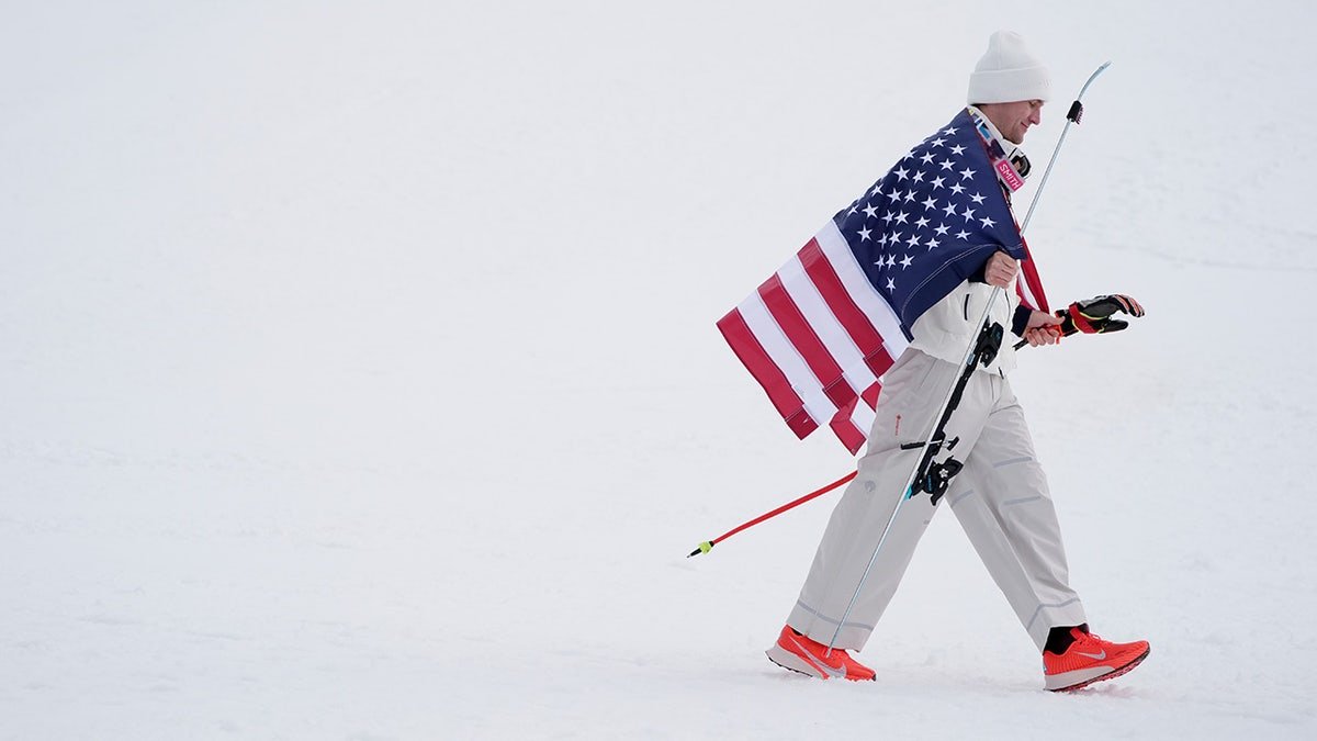 Ryan Cochran-Siegle has the American flag over his shoulder