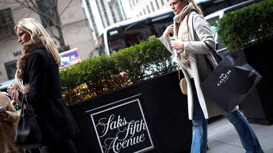 Shoppers outside Saks Fifth Avenue flagship store in Manhattan