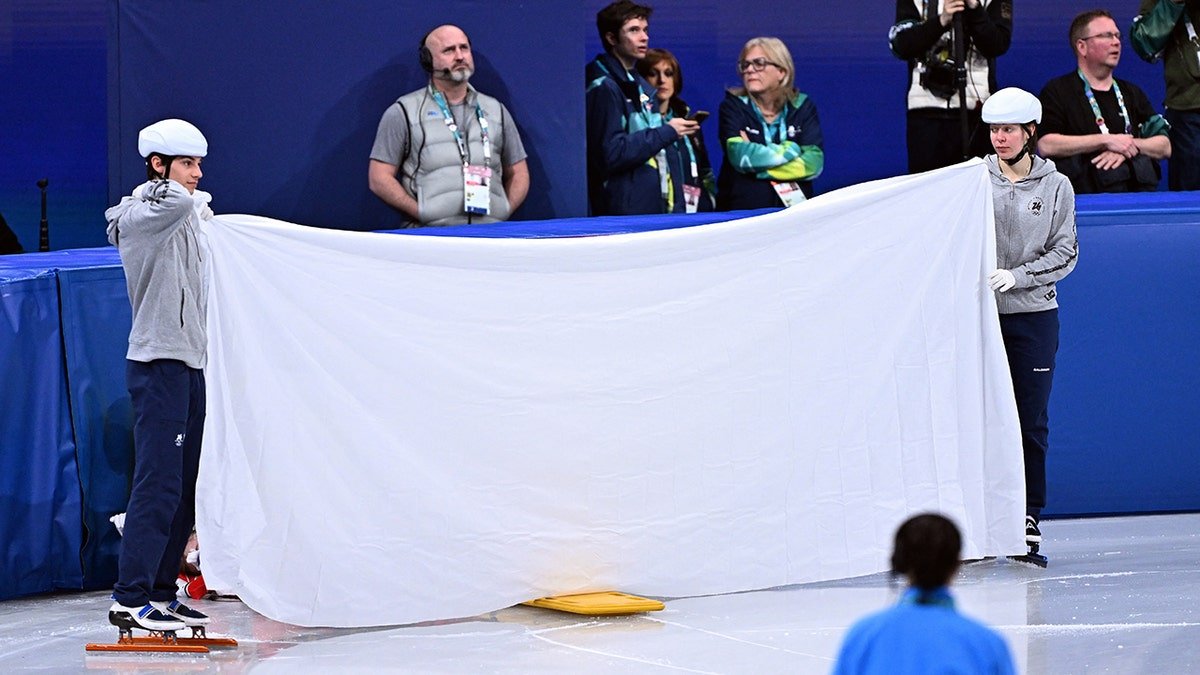 Skater shielded by blanket