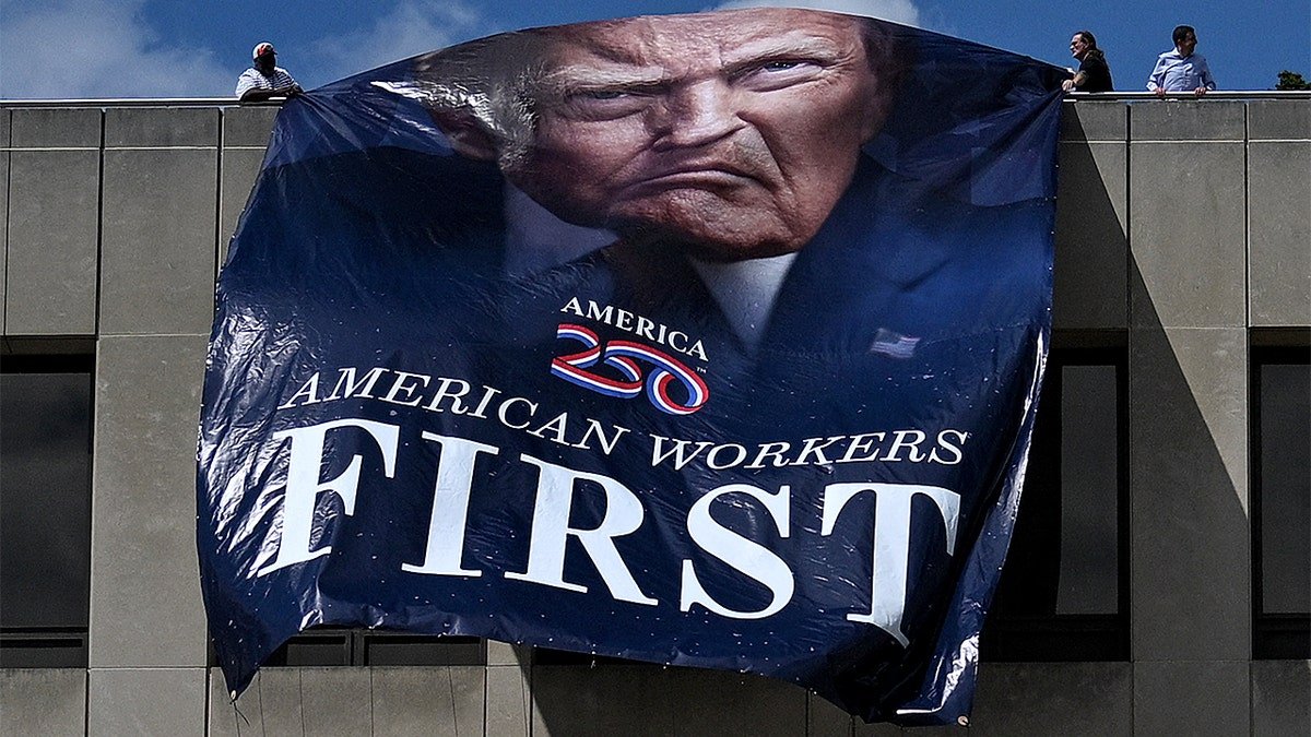 Trump flag at Department of Labor is unfurled.
