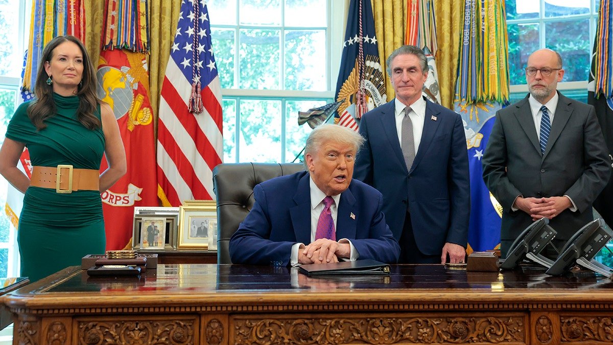 President Trump, Russell Vought and other top administration officials