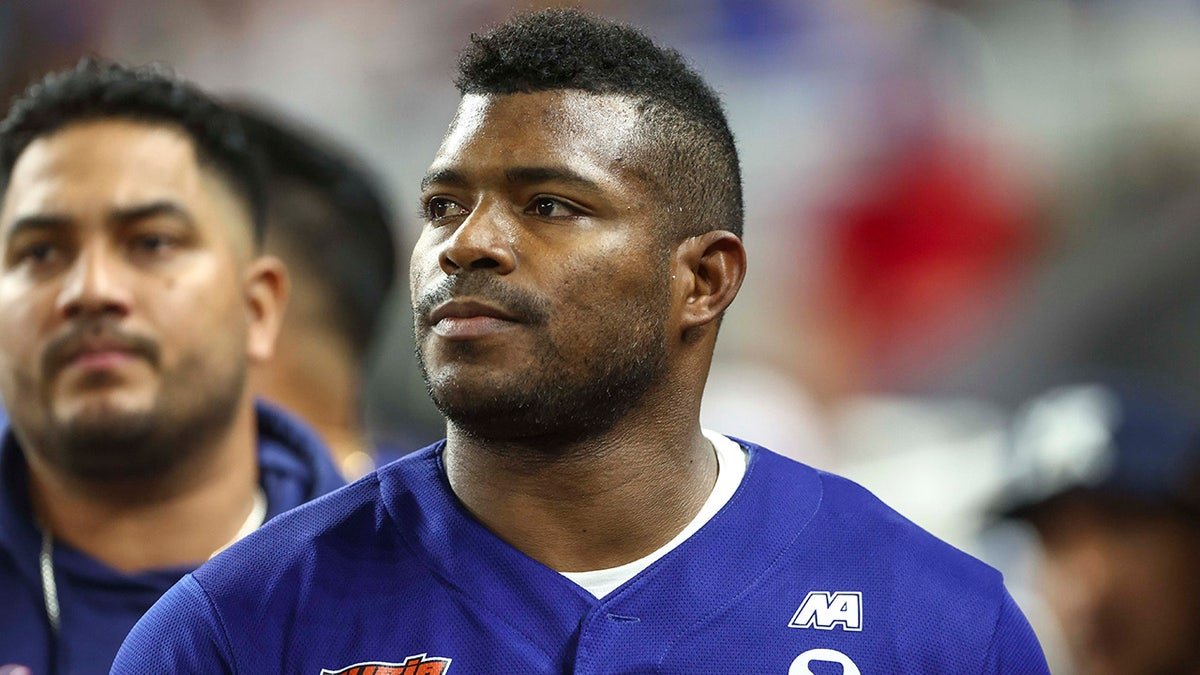Yasiel Puig reacts during a baseball game
