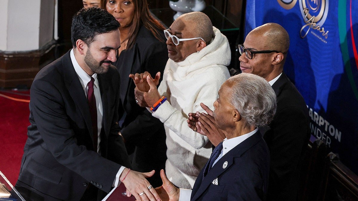 New York City Mayor Zohran Mamdani shakes hands with Al Sharpton