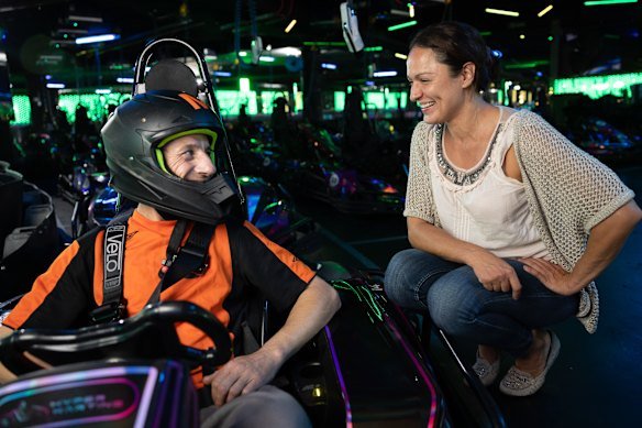 Shane Drake with his support worker Lana Susak is a regular visitor at the go-karting circuit.