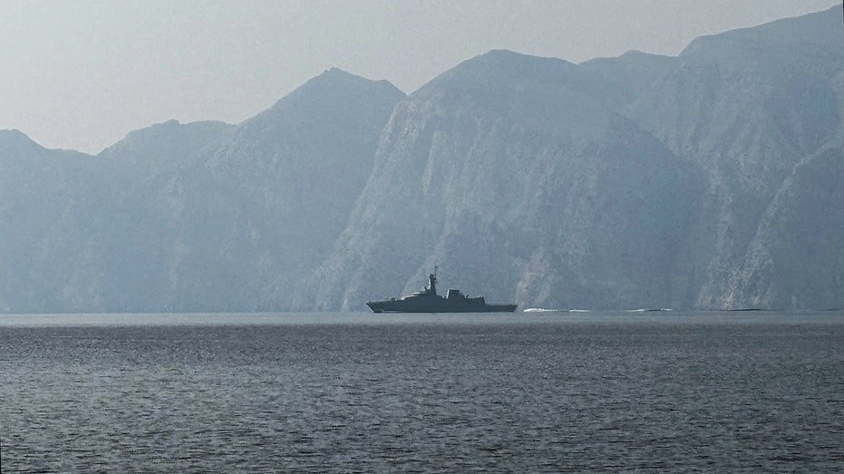 A navy vessel is seen sailing in the Strait of Hormuz