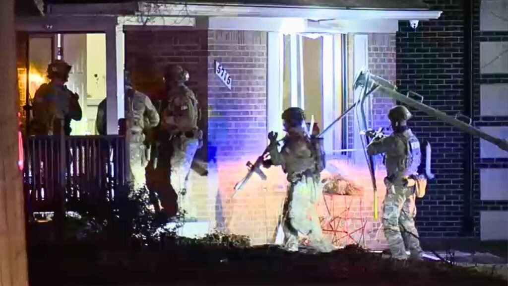 Armed FBI agents carry out search warrant believed to be in connection to synagogue attacker Armed FBI agents carry out search warrant believed to be in connection to synagogue attacker