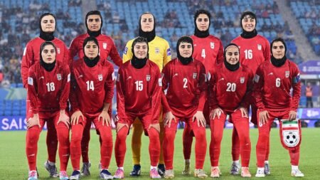 Iran wrestling champion speaks out against country’s treatment of female athletes amid soccer player concerns