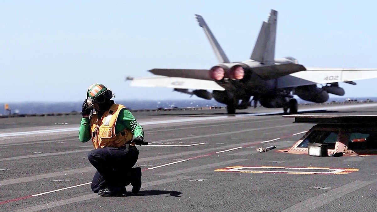 USS Gerald R. Ford conducting flight operations at sea during Operation Epic Fury.