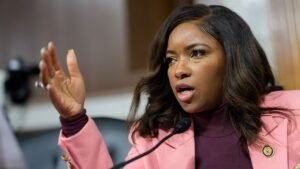 Far-left firebrand dodges questions over hiring bodyguard with criminal history Far-left firebrand dodges questions over hiring bodyguard with criminal history