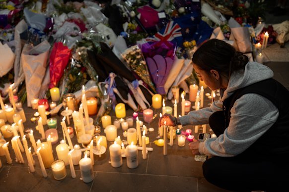 Candles to honour Aidan Becker, who was killed at Mernda station this month.