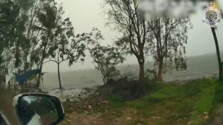 Fresh flood threat in sodden Far North Queensland towns as system hits Northern Territory Fresh flood threat in sodden Far North Queensland towns as system hits Northern Territory