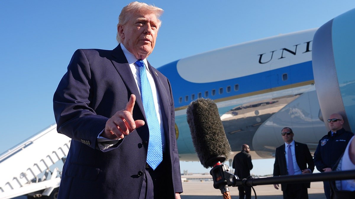 President Donald Trump speaking with the media before boarding Air Force One.