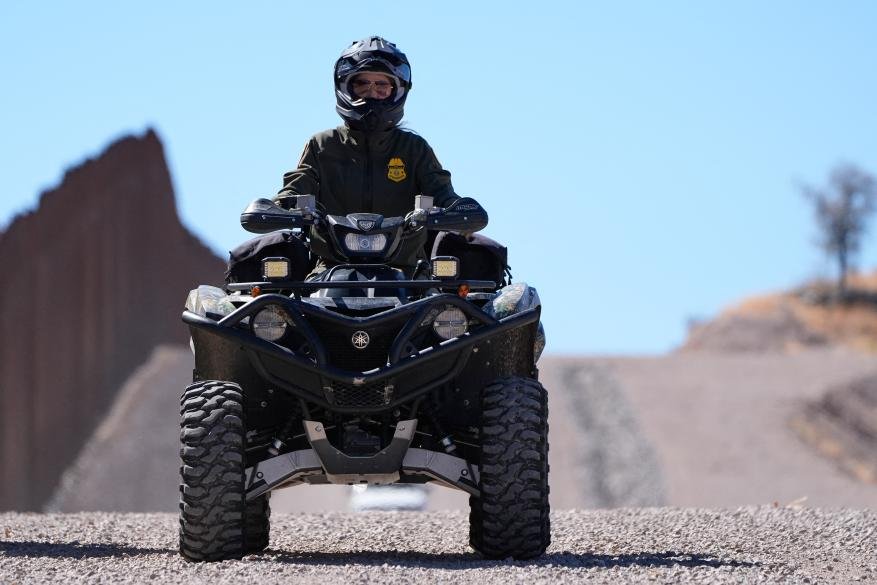 Noem riding an ATV near the border wall in Nogales, Arizona on March 15, 2026.