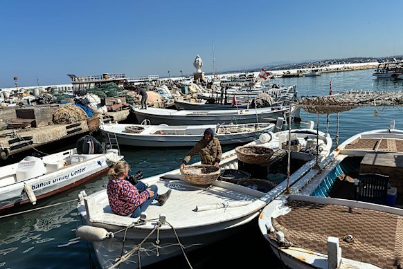 Kate Geraghty with fisherman Mehdi Istambouli at the port in Tyre.