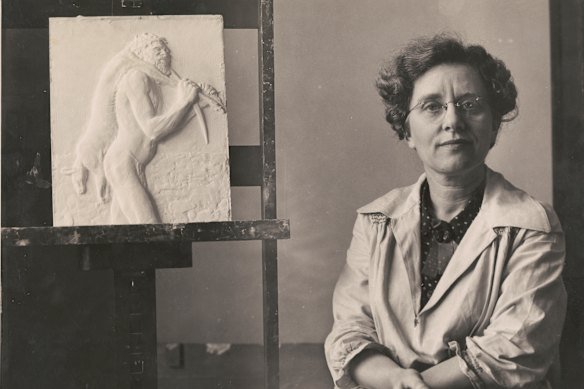 Daphne Mayo with her panel “Carrying euro Arunta tribe” for the east doors of the State Library.