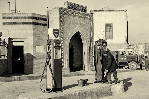 A man at a petrol pump in Tehran in 1948.