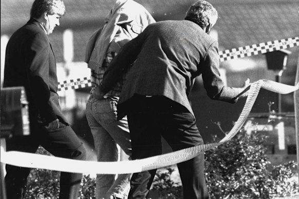 Milat is arrested after a dawn raid of his Eagle Vale home in 1994.