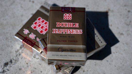 Illicit Double Happiness cigarettes, which are sold for as low as $13 in stores.