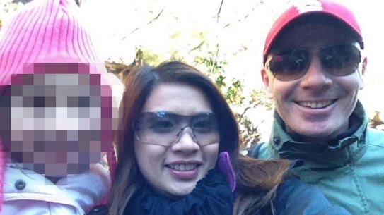 Sutasinee McGuigan (centre) and husband Patrick McGuigan. 