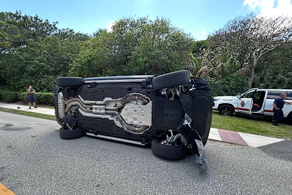 A photo supplied by the Martin County Sheriff’s Office shows Tiger Woods’ overturned vehicle in Jupiter Island, Florida. 
