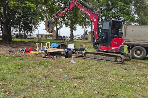 Tents being destroyed at an encampment in April after Moreton Bay Council made camping on public land illegal.