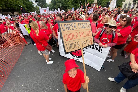 A young supporter of striking teachers demonstrates in Melbourne’s CBD on Tuesday.