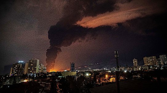 Flames and smoke rise from an Iranian oil storage facility struck during the US-Israeli military strike on Saturday.
