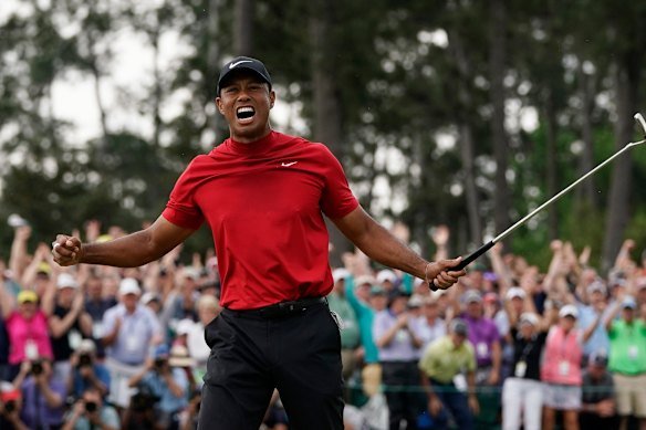 Tiger Woods reacts as he wins the Masters in 2019. 