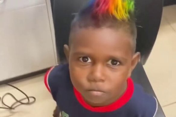 Colour my world: A child gets their hair coloured at the pop-up salon at Galiwin’ku in East Arnhem Land.
