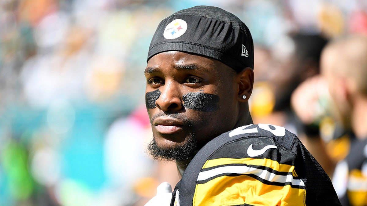Le'Veon Bell looks on before a game