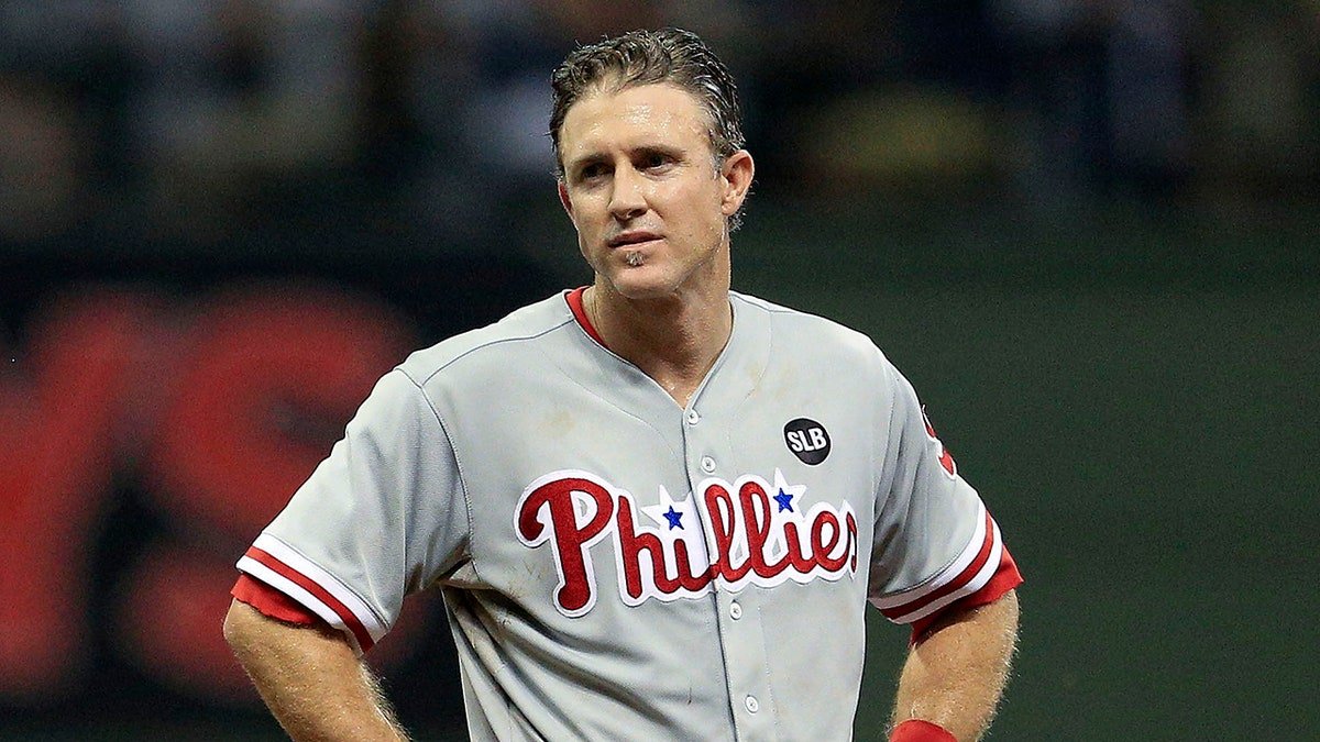 Chase Utley looks on