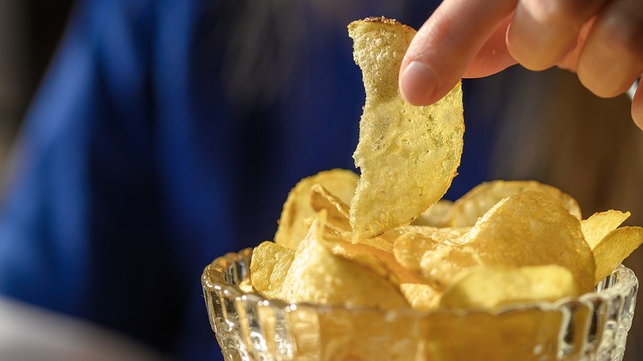 Potato chips salted in a bowl