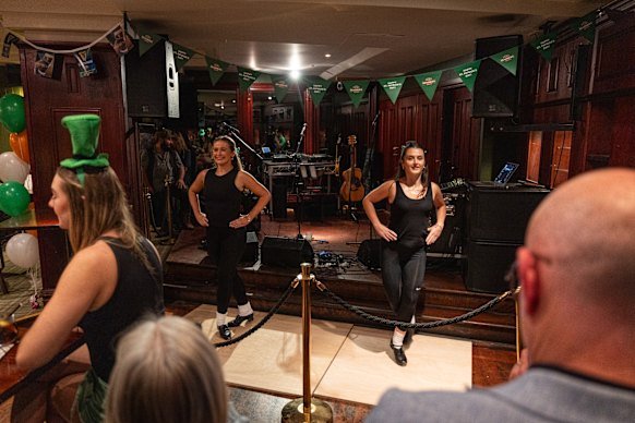 Irish dancers Bronagh (left) and Emer Maguire perform at the Harp and Hound.