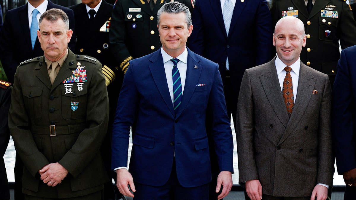 Stephen Miller, Pete Hegseth, and Francis Donovan posing for a portrait outside at U.S. Southern Command.
