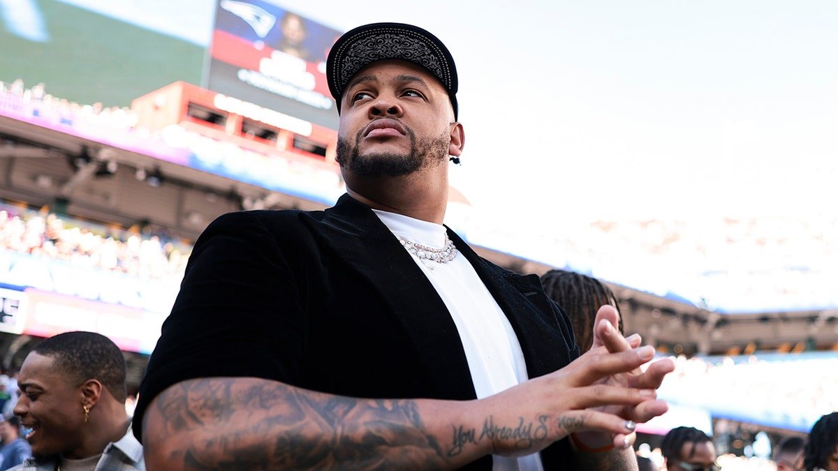 Dion Dawkins looks on field